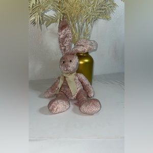 What a cutie Blushes pink bunny not new but in good condition one size.